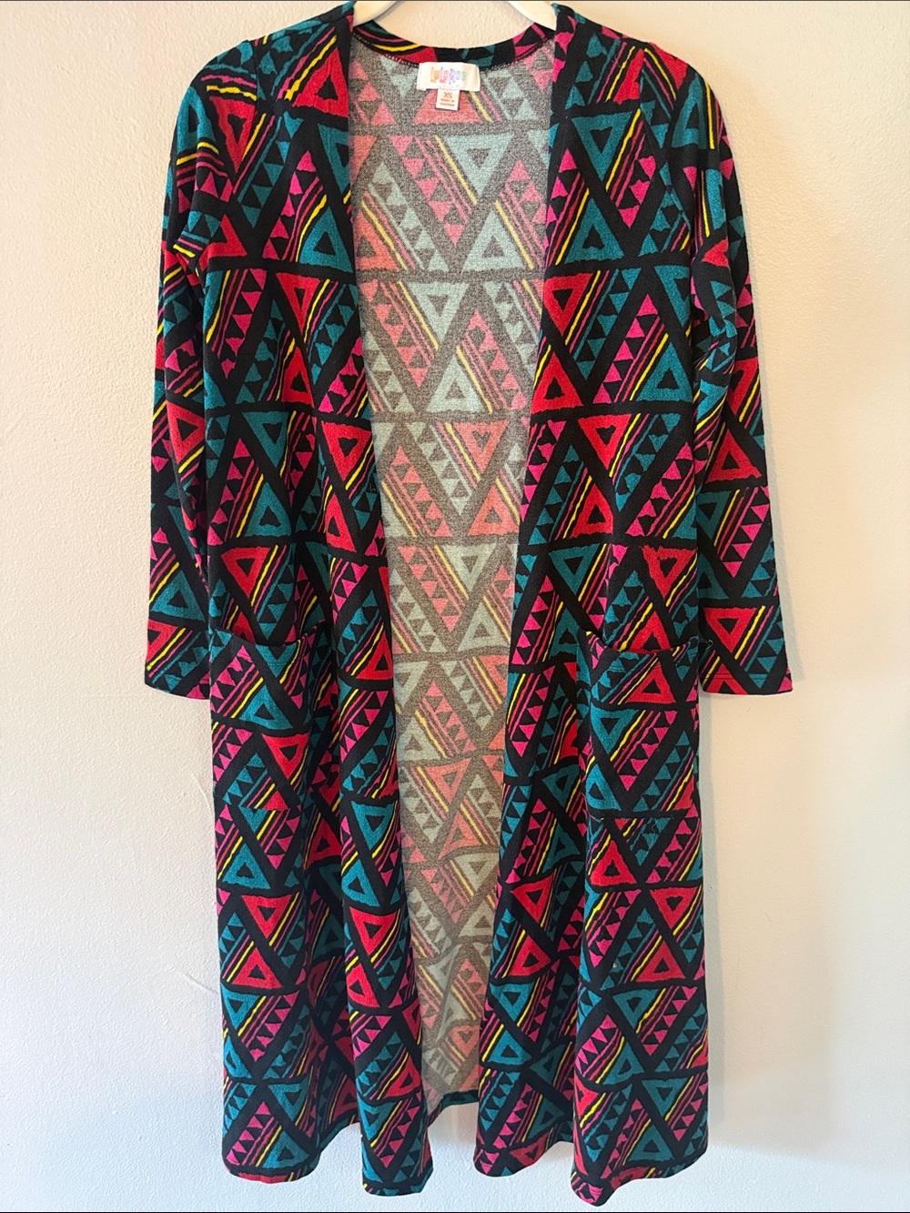 LuLaRoe Black Open-Front Cardigan with Pink, Teal & Red Geometric Print